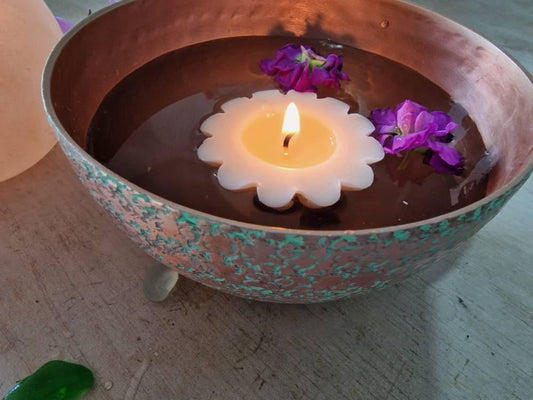 Beautiful hammered bowl with hand poured scented floating tealights - thepurehaven